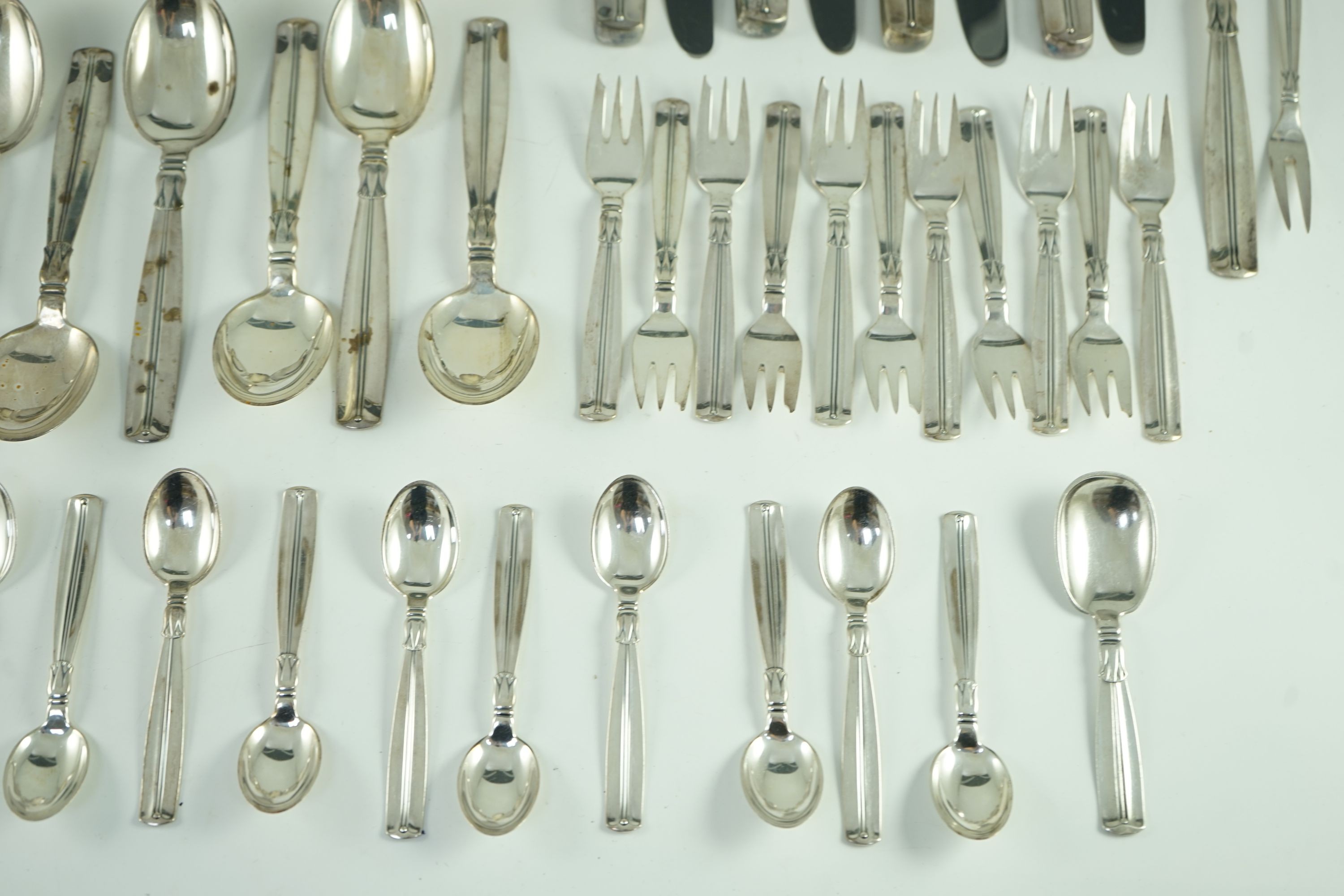 A mid 20th century harlequin part canteen of Danish 830 standard flatware by Broderne, W & S Sorensen